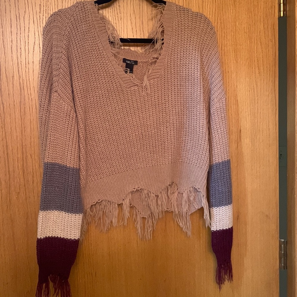 Distressed v-neck knitted sweater